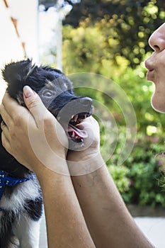 Woman holding a dog