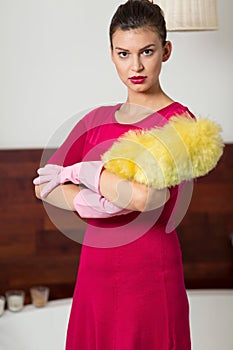 Woman holding a dust brush