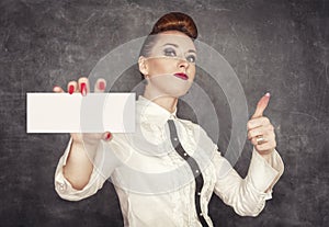 Woman holding empty banner in her hand