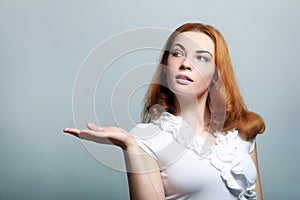 Woman holding an empty copy space