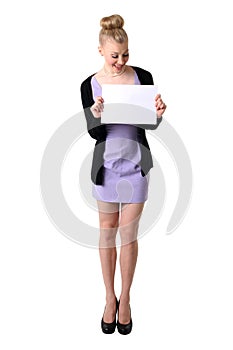 Woman holding empty white board.