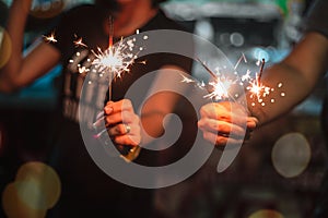 Woman holding fireworks