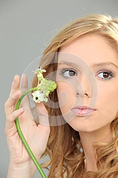 Woman holding a flower