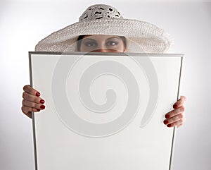 Woman holding frame
