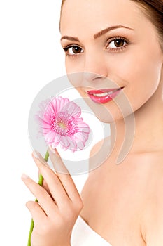 Woman holding gerbera daisy