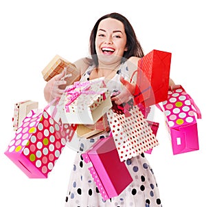 Woman holding gift box at birthday party.