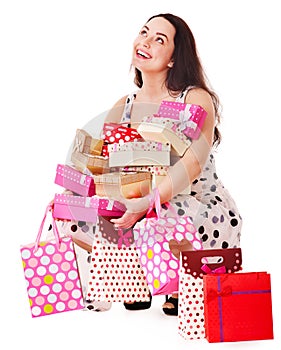 Woman holding gift box at birthday party.