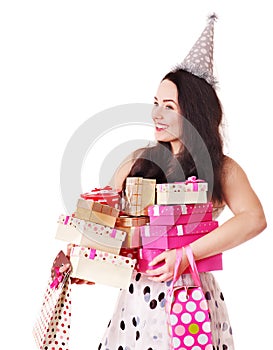 Woman holding gift box at birthday party.