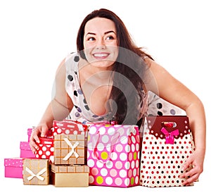 Woman holding gift box at birthday party.