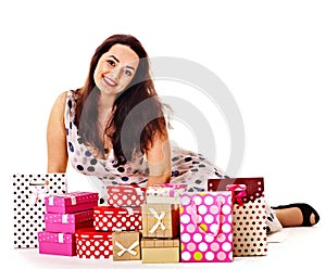 Woman holding gift box at birthday party.