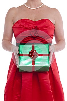 Woman holding gift wrapped present.