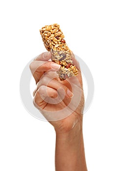 Woman Holding Granola Bar on White