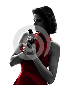 woman holding gun silhouette