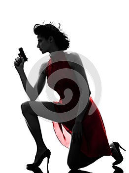 woman holding gun silhouette