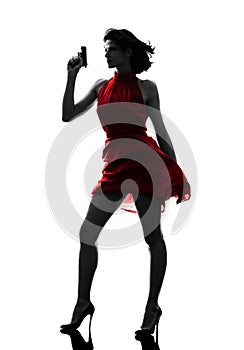 woman holding gun silhouette