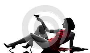 woman holding gun silhouette