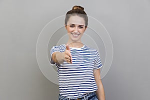 Woman holding hand for handshake, happy to make agreement, successful partnership.