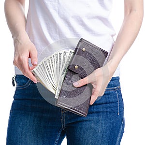 Woman holding in hand money dollars wallet