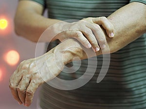 Woman holding hands rare disorder body immune system attacks nerves, Guillan Barre Syndrome, Vaccine covid-19 coronavirus
