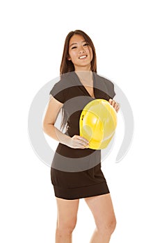 Woman holding hard hat