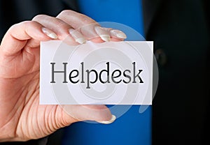 Woman Holding Helpdesk Sign