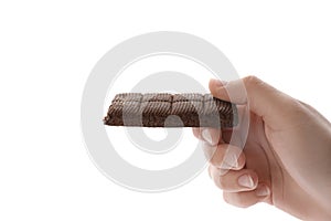 Woman holding hematogen bar on white background, closeup