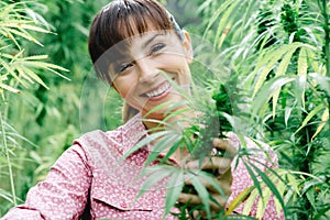 Woman holding hemp flowers