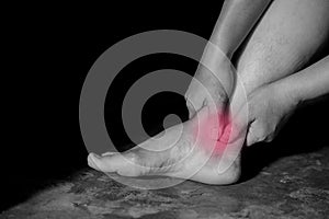 Woman holding her ankle symptomatic Office Syndrome