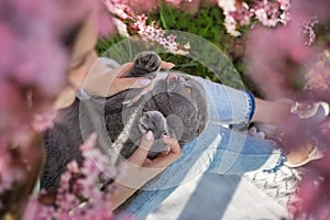 Woman holding her cat