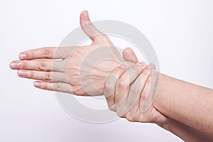 Woman holding her wrist. Pain concept.