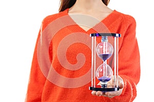 Woman holding hourglass on white background. Time management concept