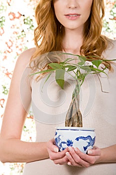 Woman holding houseplant