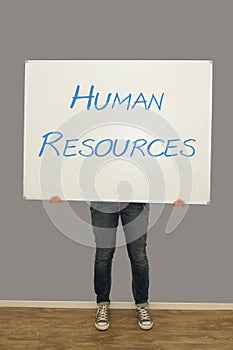 Woman holding human resources sign