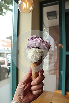 Woman holding ice cream cone