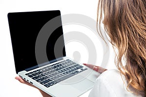 Woman holding laptop