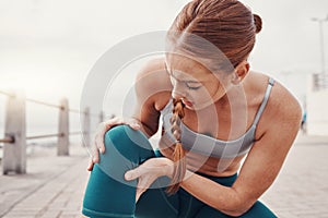 Woman holding leg, knee injury in outdoor exercise and injured joint inflammation from training. Person exercising with