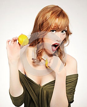 Woman holding a lemon