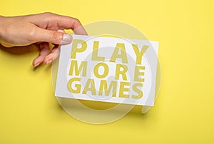 Woman holding letter on yellow background