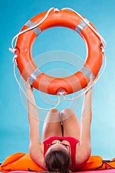 Woman holding life buoy ring