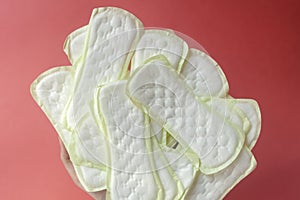 Woman holding a lot of panty liners