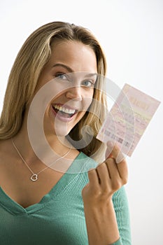 Woman Holding Lottery Ticket