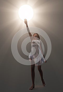Woman holding luminous sphere