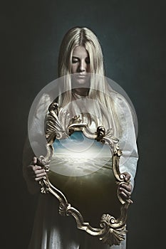 Woman holding magical mirror