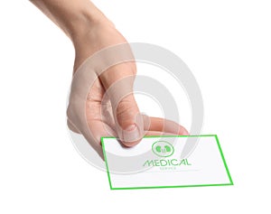 Woman holding medical business card isolated on white. Nephrology service photo