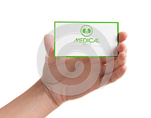Woman holding medical business card on white, closeup. Nephrology service