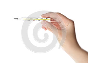 Woman holding mercury thermometer on background, closeup