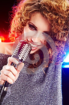 Woman holding microphone
