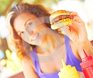 Woman Holding Mini Hamburger