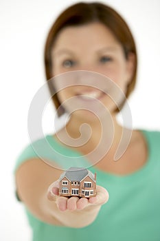 Woman Holding Model House