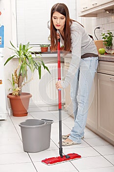 Woman holding a mop